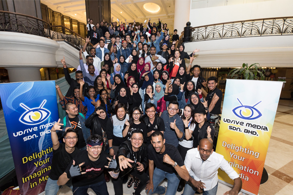 UDrive Media team gathered at a company event