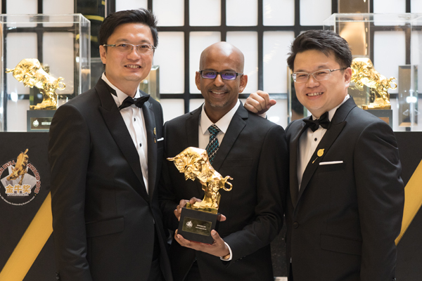UDrive representatives holding the award trophy